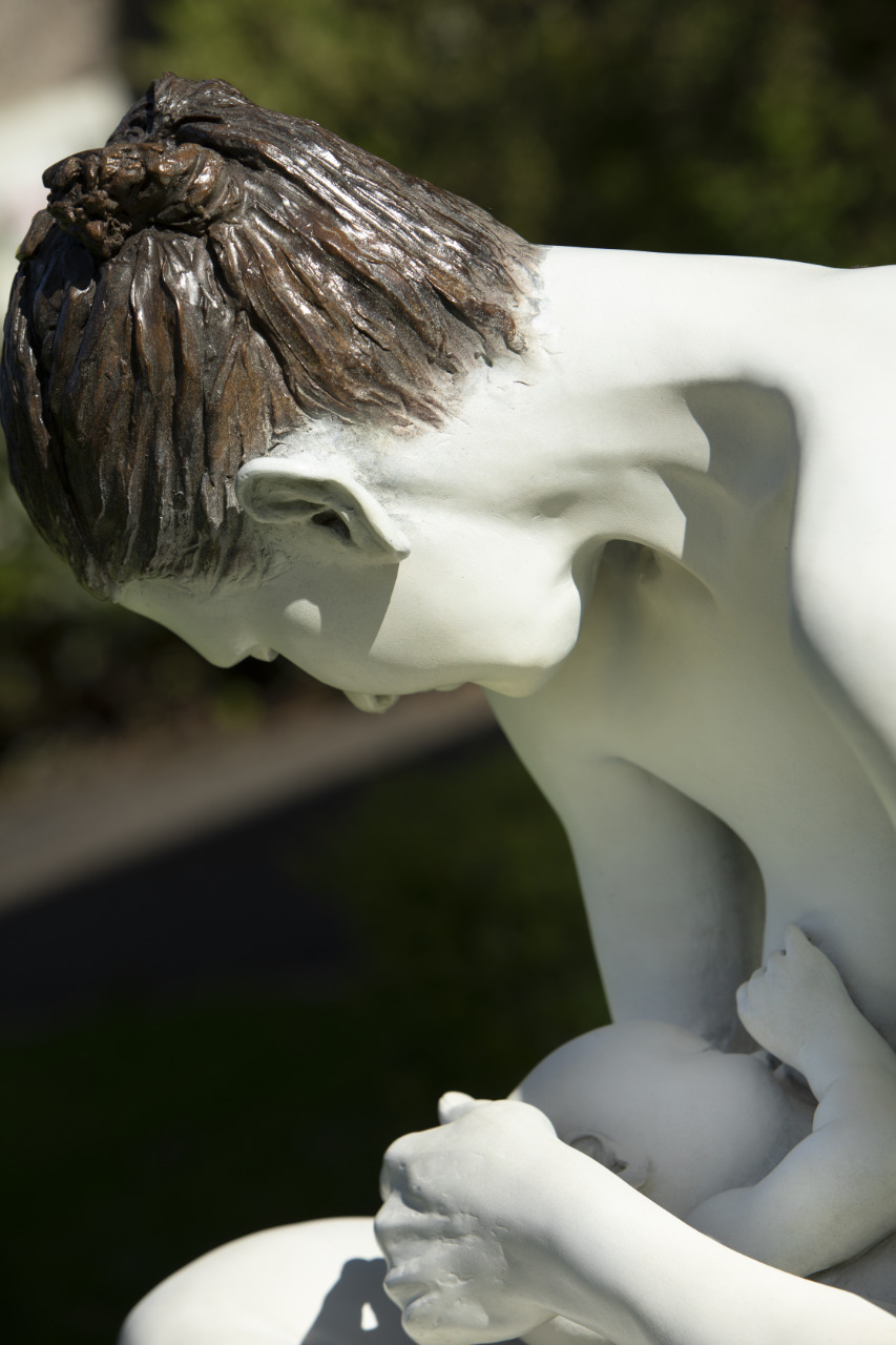 Paddy Campbell making the “baby“ Coco in wax while Emily took a break