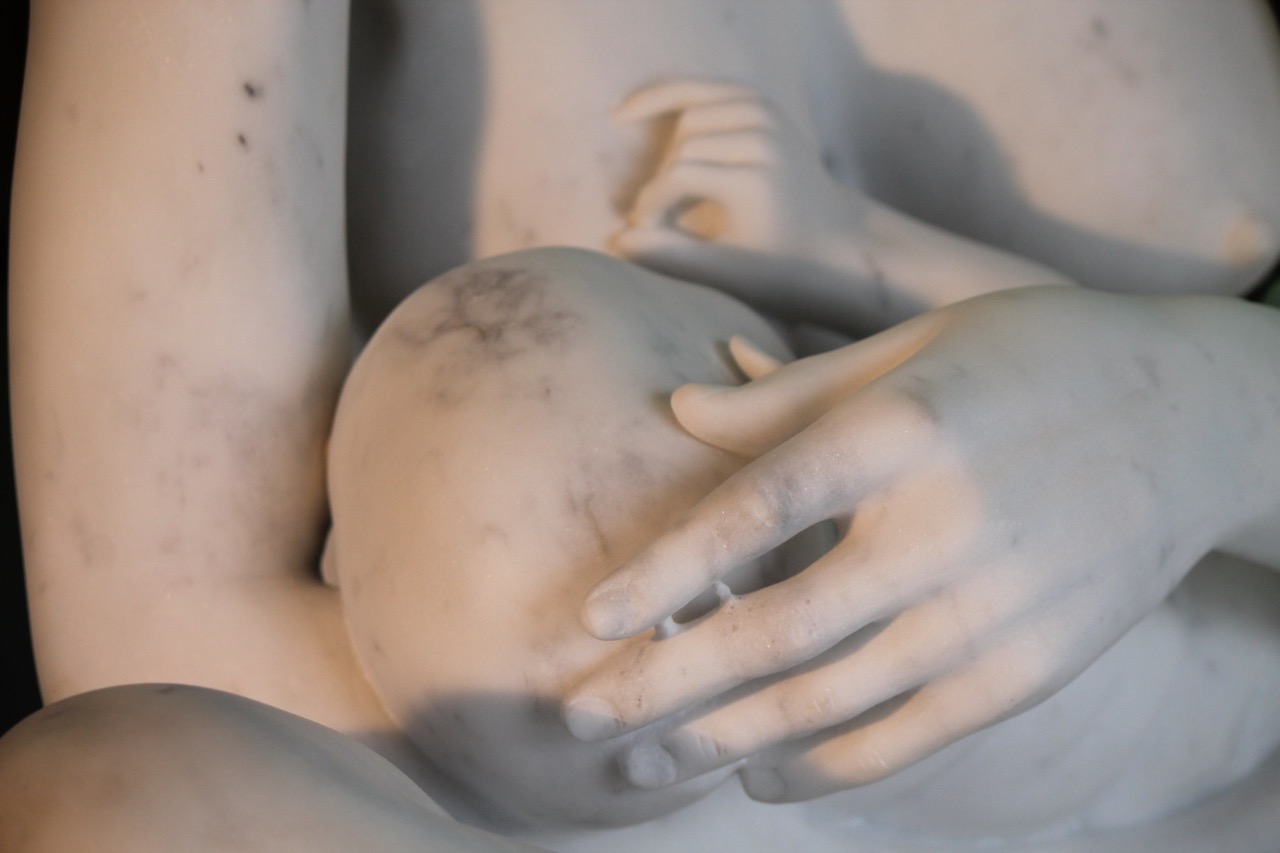 Mother and baby hands express the love between them